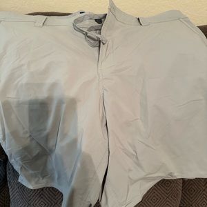 Men’s microfiber shorts. Button, zipper and tie front.